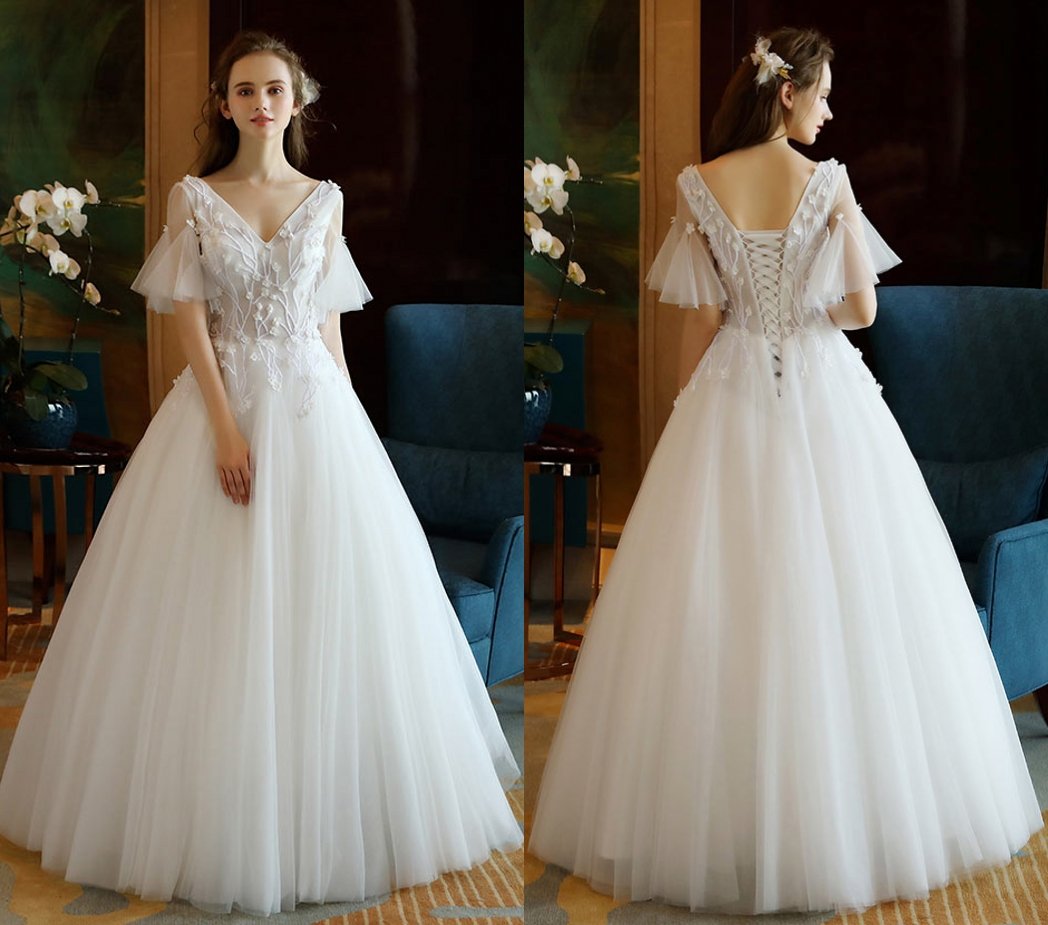 robe de mariée princesse à col en v bustier transparent ligne A